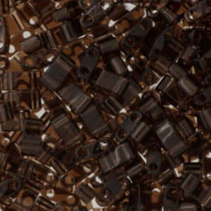 Miyuki Sachet 10grs Half Tila 5x2.3x1.9mm Brun Foncé Transparent N°135